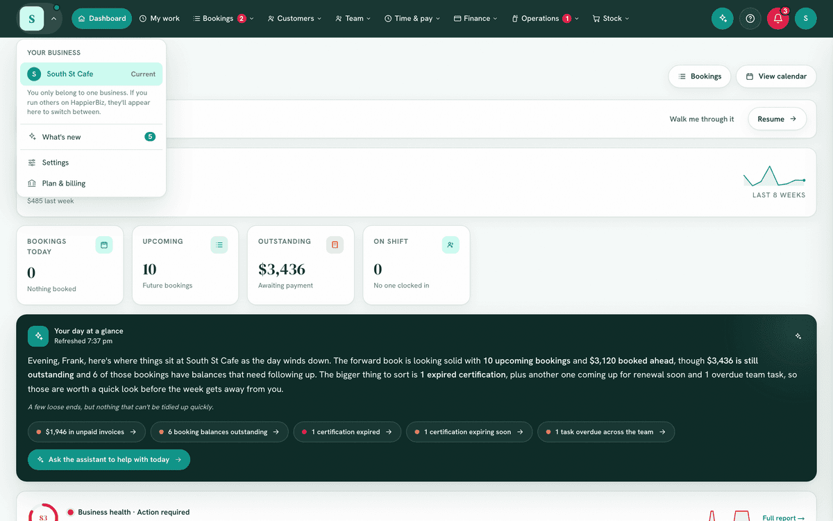 The workspace switcher menu open, listing businesses.